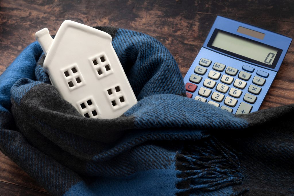 Calculator, home and scarf from H2 Property Services
